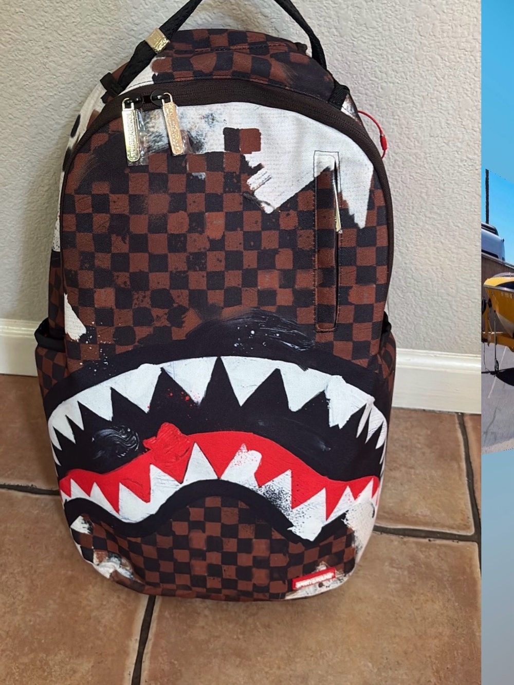 Sprayground Brown Checkered Shark-Mouth Graphic Backpack with Red Accents